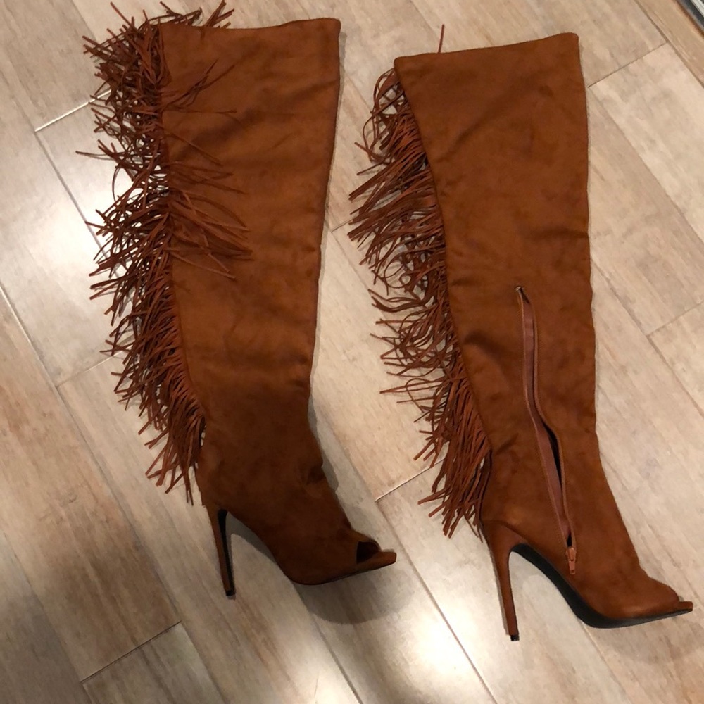 Thigh high faux suede fringed boot
